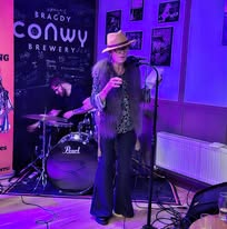 Julie Vann performing with G-String